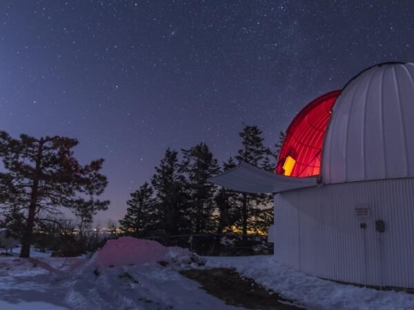 an observatory on a starry night