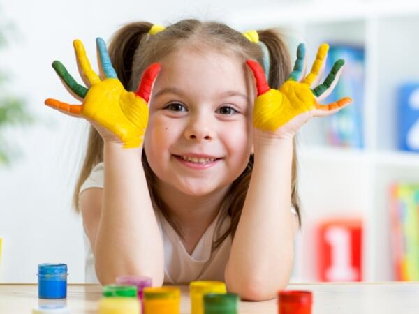 girl playing with colors